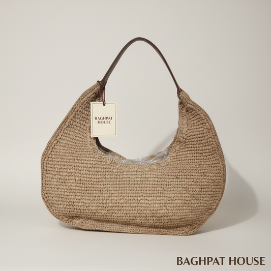 Mijas wheat raffia hobo bag by Baghpat House